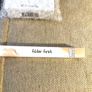 Laura Geller filter first concealer TAN